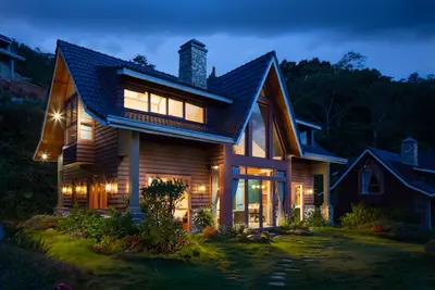 Home photographed at dusk in a sample listing post